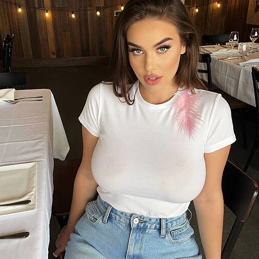 Playful Busty Woman in Classic White T-Shirt and High-Waisted Jeans Casual Outfit