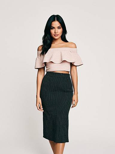 Woman in Stylish Off-Shoulder Pink Crop Top and Black Pinstripe Midi Skirt