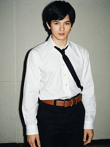 Young Man Wearing White Shirt with Black Tie and Brown Belt