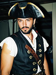 Man in Sleeveless Pirate Costume with Black Tricorn Hat