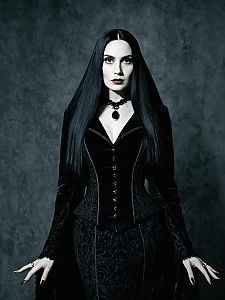 Woman in Morticia Addams Costume Gothic Style