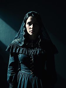 Woman in La Llorona Costume with Dramatic Shadow Lighting