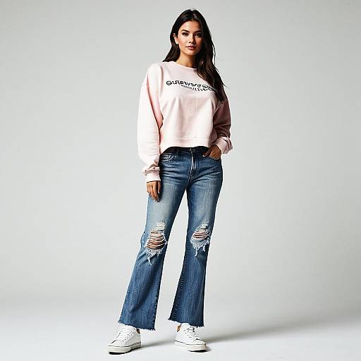 Casual Streetwear Fashion Woman in Cropped Sweatshirt and Distressed Jeans