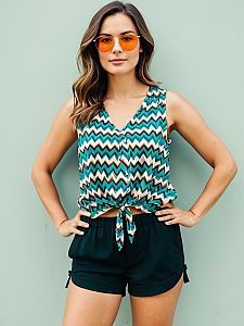 Woman in Teal Brown Zigzag Sleeveless V-Neck Top and Black Shorts Summer Outfit