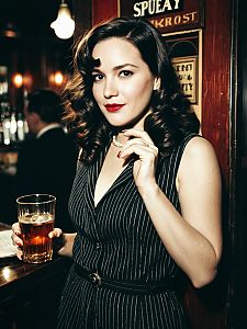 Vintage 1920s Speakeasy Costume Woman Holding Drink in Bar