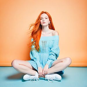 Red-haired Woman in Blue Off-Shoulder Dress