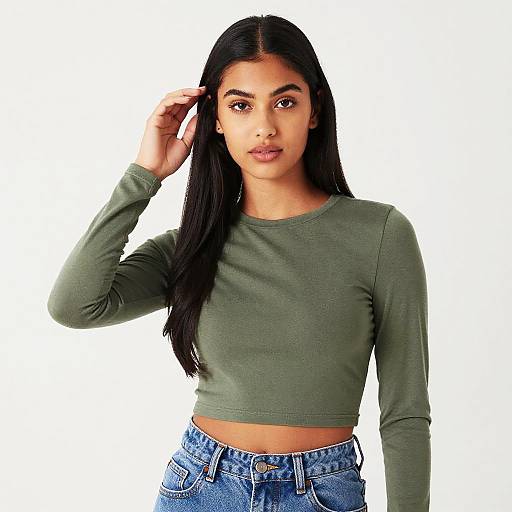 Young Woman Wearing Olive Green Crop Top and Blue Jeans Casual Fashion