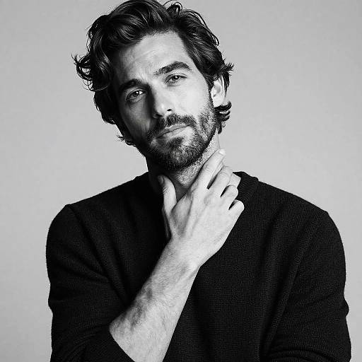 Black and White Portrait of Thoughtful Young Man with Beard