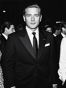 Man in Formal Attire at Fashion Event Black and White Photo