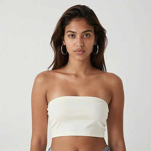 Confident Gen Z Woman in White Tube Top with Hoop Earrings