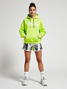 Woman Wearing Bright Neon Green FILA Hoodie with Silver Sporty Shorts