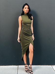 Chic Olive Green Bodycon Dress with High Neckline and Asymmetrical Hemline