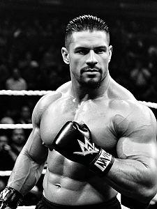Powerful WWE Fighter in Boxing Gloves Inside Wrestling Ring Black and White