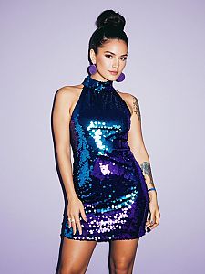 Woman Party Ready in Sequined Purple and Blue Mini Dress