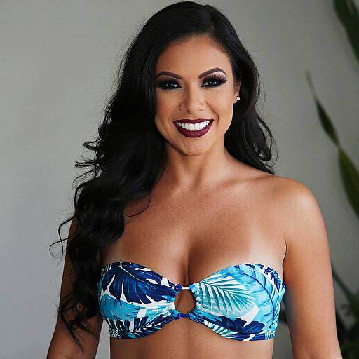 Confident Woman Wearing Blue Tropical Bandeau Bikini Top Smiling