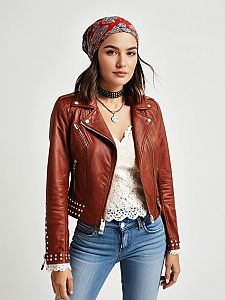 Woman in Tan Leather Biker Jacket with Studs and Casual Chic Style