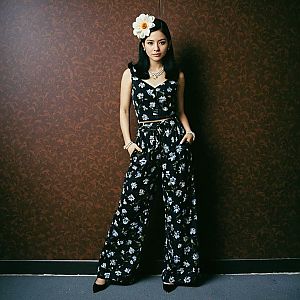 Confident Woman in Floral Outfit