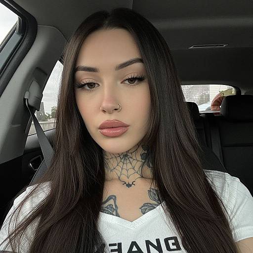 Portrait of Tattooed Woman in Car with Nose Ring
