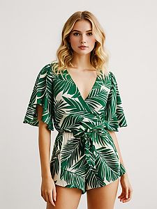 Woman in Tropical Chic Deep V Neck Green and White Romper