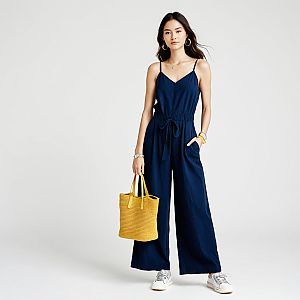 Woman in Casual Summer Navy Jumpsuit with Accessories