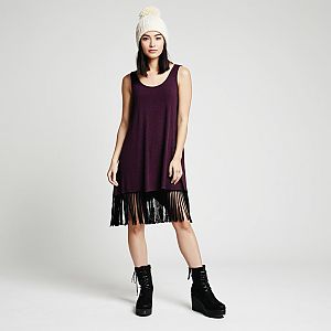 Woman Wearing Deep Plum Boho Tank Top Dress with Fringe and White Beanie