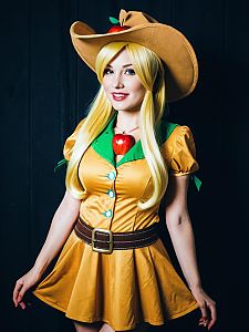 Woman in Realistic Applejack Cosplay Costume with Cowboy Hat