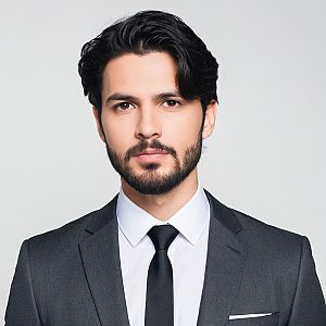 Confident Man in Dark Suit - Professional Portrait