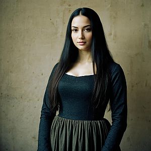 Woman in Mona Lisa Inspired Costume with Long Black Hair in Black Dress