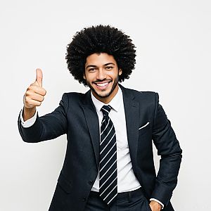 Confident Young Man in Suit Giving Thumbs Up Gesture