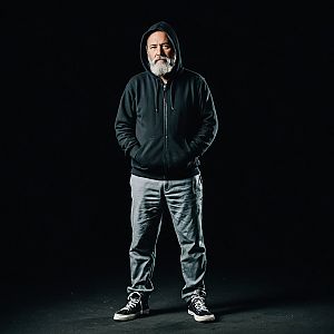 Mature Man in Black Hoodie