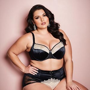 Confident Plus-Size Woman in Elegant Lingerie