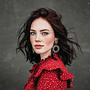 Portrait of a Woman with Red Hair and Freckles