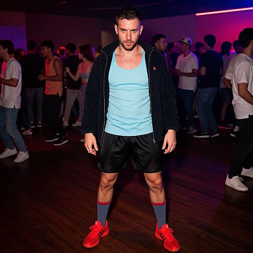 Confident Man in Athletic Wear at Nightclub Party