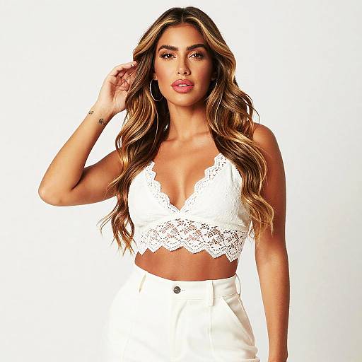 Woman in White Lace Crop Top and High-Waisted Pants Fashion Portrait
