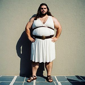 Plus-size man in Greek toga with belt and sandals