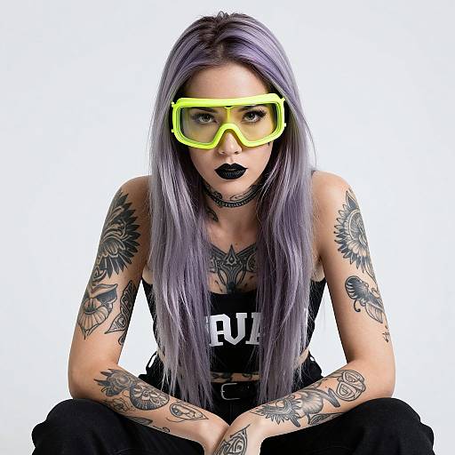 Edgy Tattooed Woman with Neon Goggles