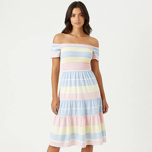 Photograph of a young woman with medium skin tone, dark wavy hair, wearing an off-shoulder, pastel-striped dress with light blue