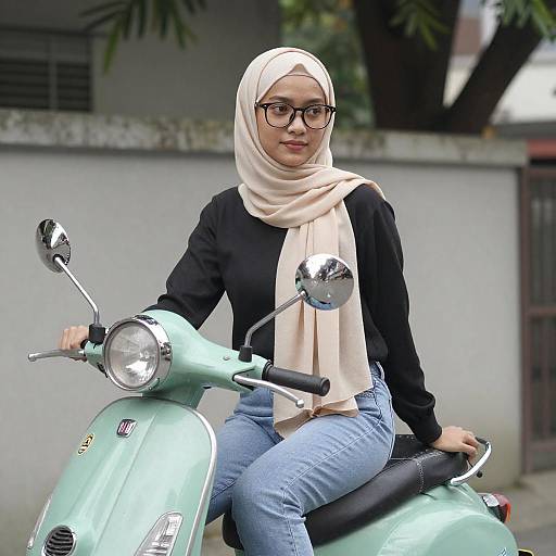 Young Woman on Green Scooter