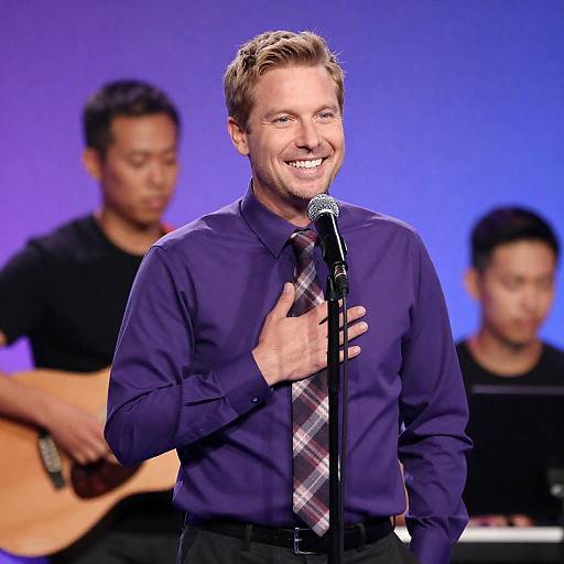 Smiling Man at Microphone Performance