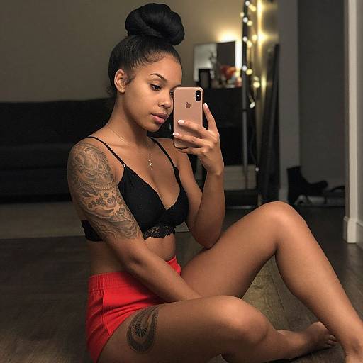 Young Woman Taking Mirror Selfie