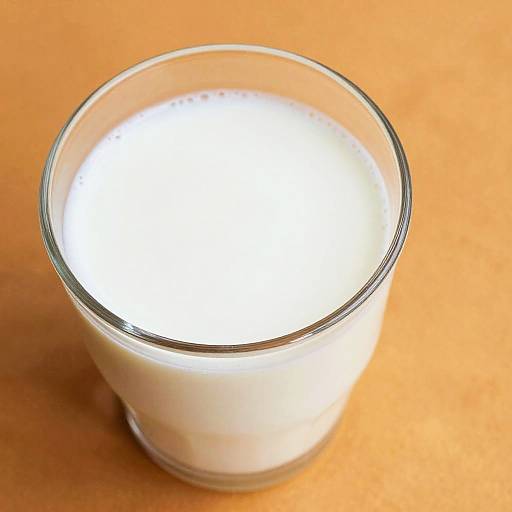 Close-Up Glass of Milk on Orange