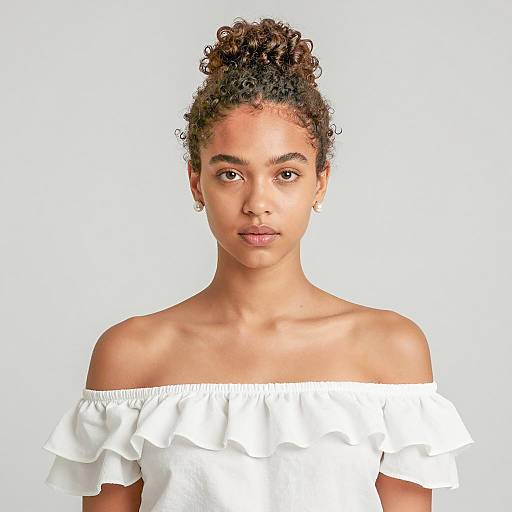 Young Woman in White Off-Shoulder Top