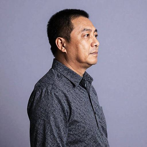 Serious Man in Patterned Shirt Portrait