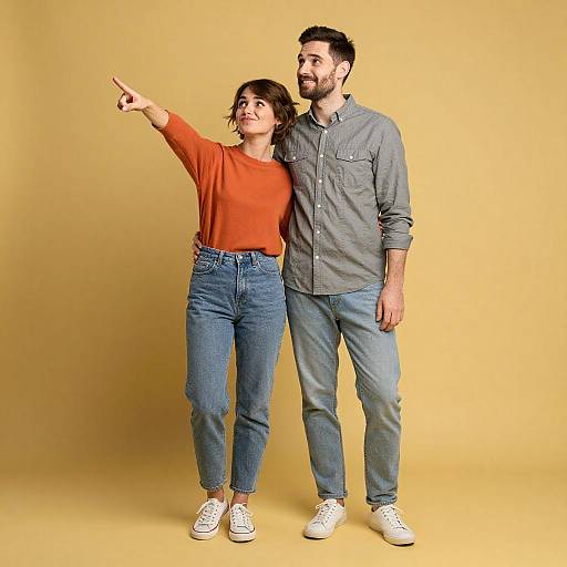Playful Couple in Mustard Background