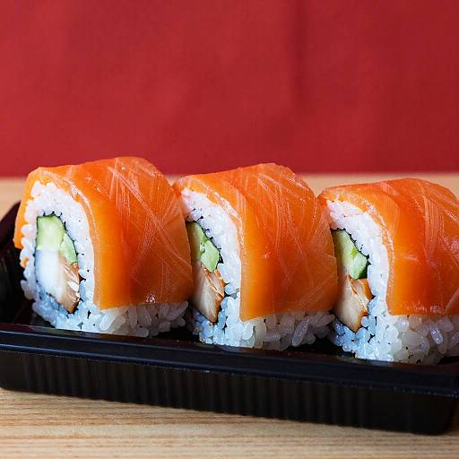 Vibrant Orange Sushi Rolls Close-Up