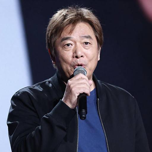 Focused Middle-Aged Man With Microphone