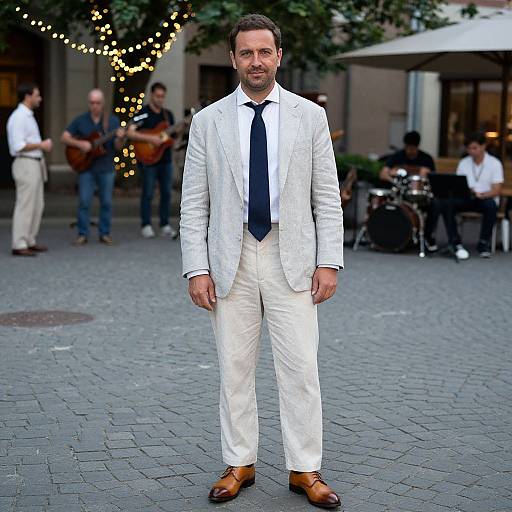 Stylish Man in Linen Suit on Cobblestone