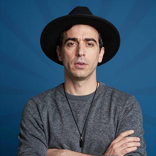 Man Wearing Black Hat and Gray Sweater