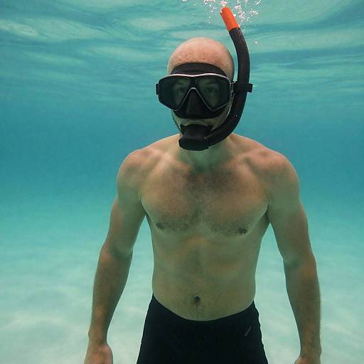 Muscular Man Snorkeling Underwater