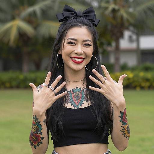 Smiling Asian Woman with Tattoos